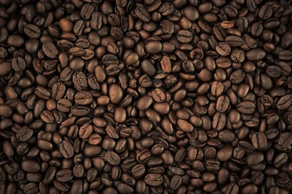 Kaffeebohnen Nahaufnahme Hintergrund (gefiltertes Bild verarbeitet Vinta — Stockfoto