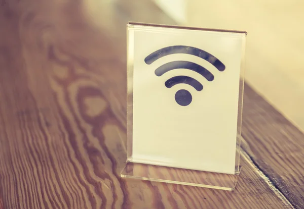 Free Wifi sign on table ( Filtered image processed vintage effec — Stock Photo, Image