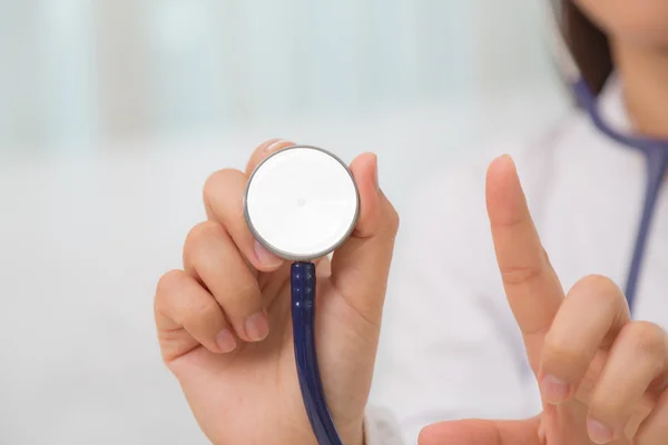 Doctor with stethoscope in the hands — Stock Photo, Image