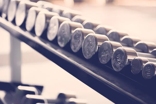 Sports dumbbells  ( Filtered image processed vintage effect. ) — Stock Photo, Image