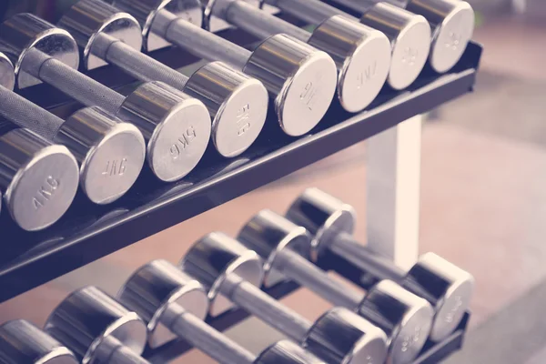 Sports dumbbells  ( Filtered image processed vintage effect. ) — Stock Photo, Image