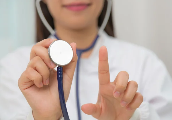 Doctor with stethoscope in the hands — Stock Photo, Image