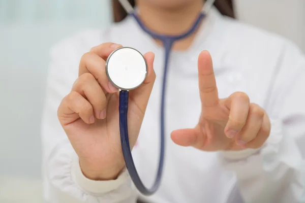 Doctor with stethoscope in the hands — Stock Photo, Image