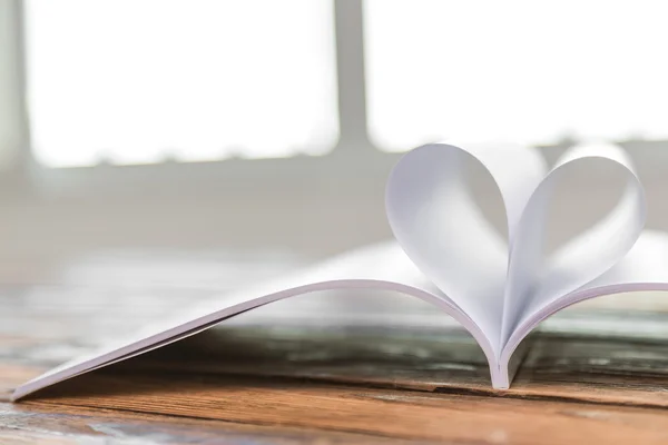 Book with opened pages of shape of heart — Stock Photo, Image