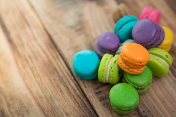 French colorful macarons on wood table — Stock Photo, Image