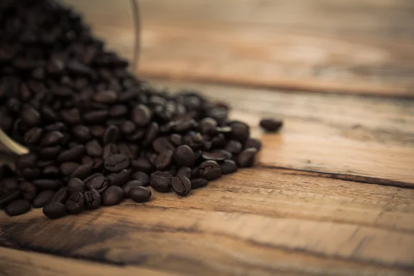 Coffee on wooden table — Stock Photo, Image