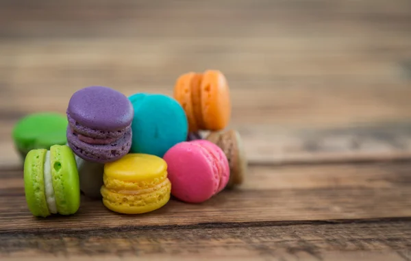 French colorful macarons on wood table — Stock Photo, Image