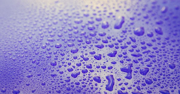 Drops of water on blue floor — Stock Photo, Image