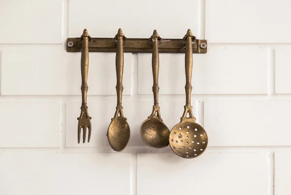 Vintage kitchen spoon  and fork hanging — Stock Photo, Image