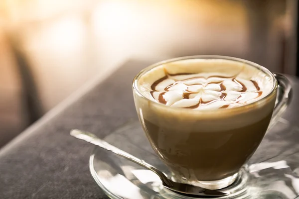 Hot latte art coffee on table — Stock Photo, Image