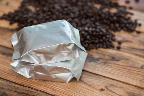 New coffee foil bag on wood table