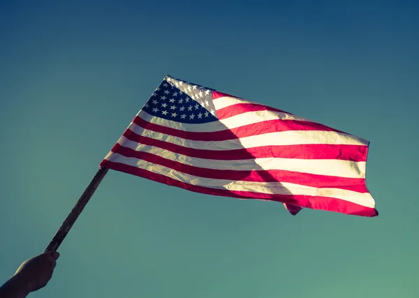 Flag over blue sky — Stock Photo, Image