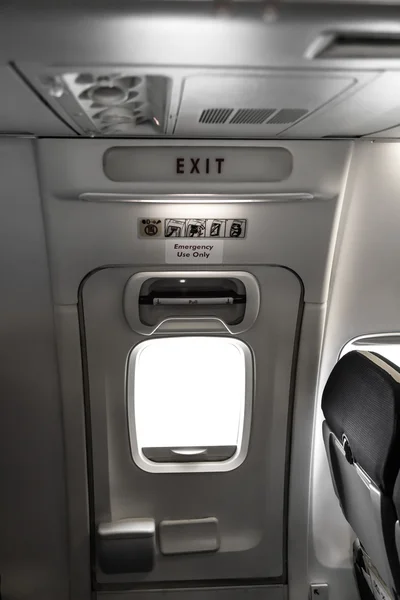 Emergency exit in aircraft — Stock Photo, Image