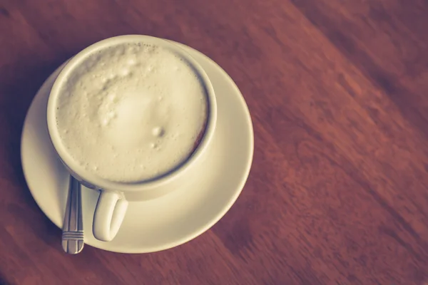 Latte art kaffe på bordet — Stockfoto