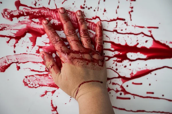 Hand in blood on wall — Stock Photo, Image