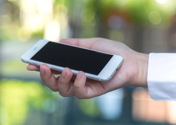 Hand holding Smartphone — Stock Photo, Image