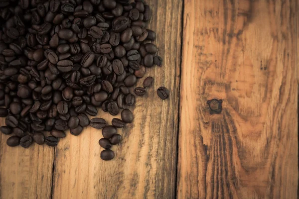 Coffee beans on table — Stock Photo, Image