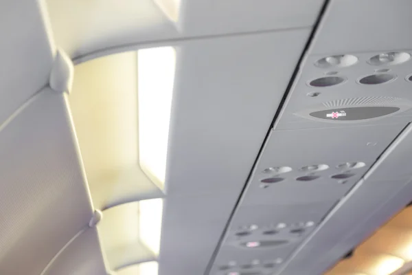 No smoking sign on airplane — Stock Photo, Image