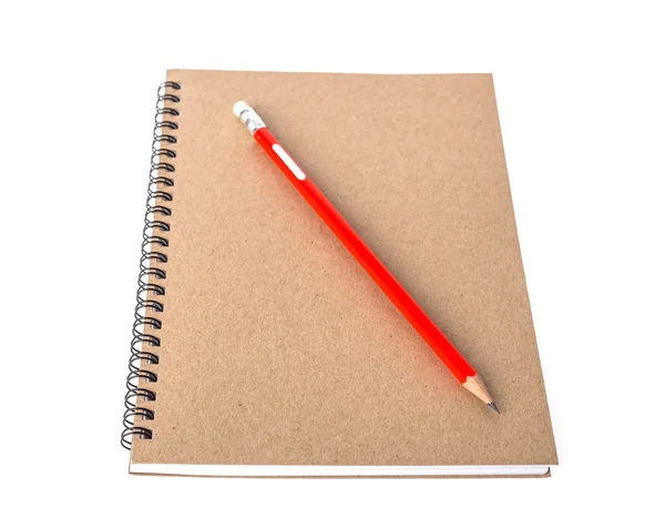 Rood potlood op lege notebook — Stockfoto