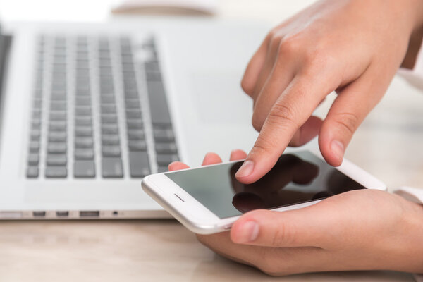 Woman hand hold smart phone