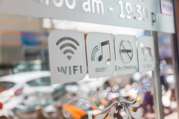 Signs on glass door — Stock Photo, Image