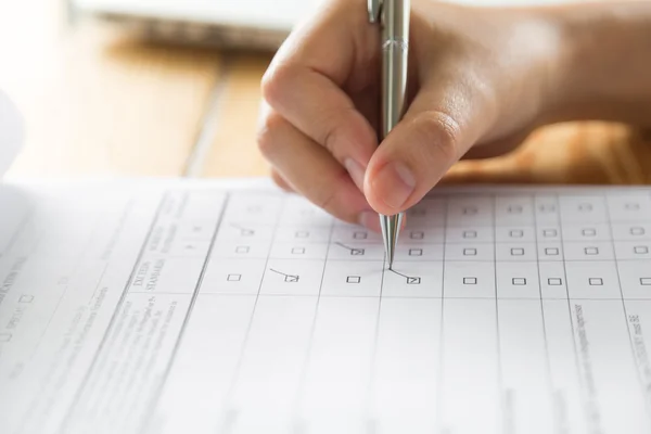 Hand with silver pen — Stock Photo, Image