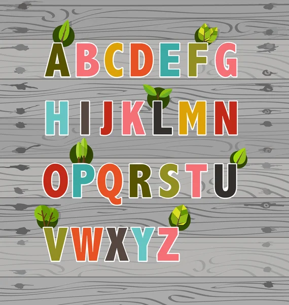 Lettres colorées avec des arbres — Image vectorielle