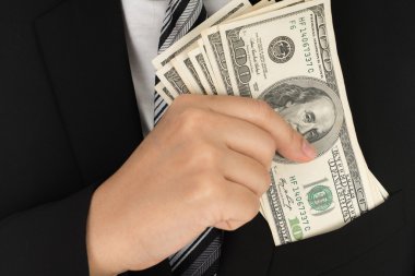 İş adamı ile dolar banknotlar
