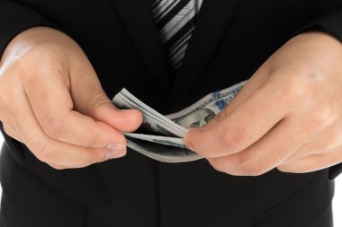 Dolar banknotlar holding iş adamı