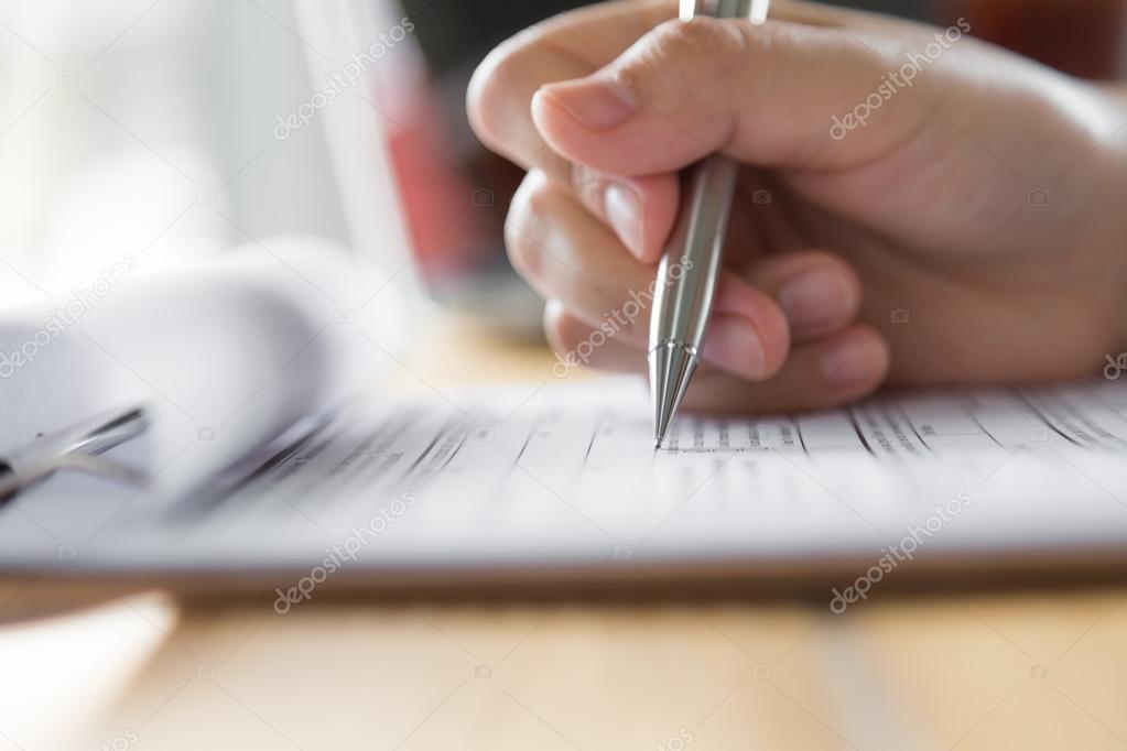 human Hand with pen
