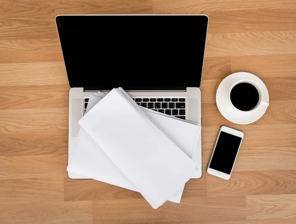 Laptop with coffee cup and smart phone — Stock Photo, Image