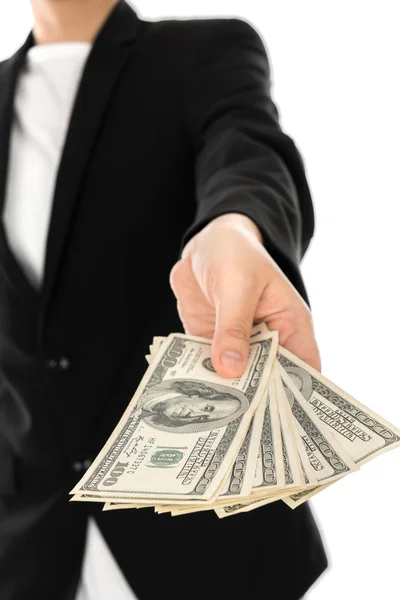 Biznes człowiek trzyma Banknoty dolarów — Zdjęcie stockowe