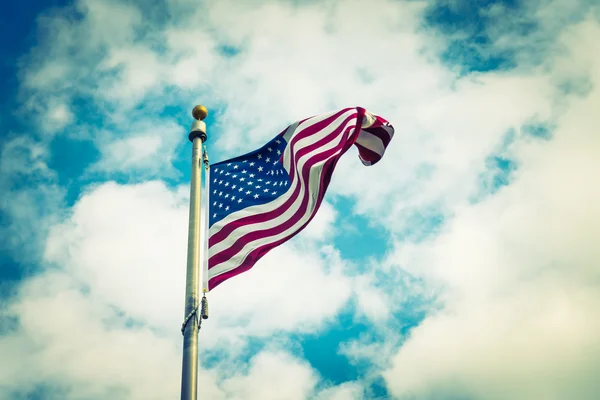 American flag on blue sky — Stock Photo, Image