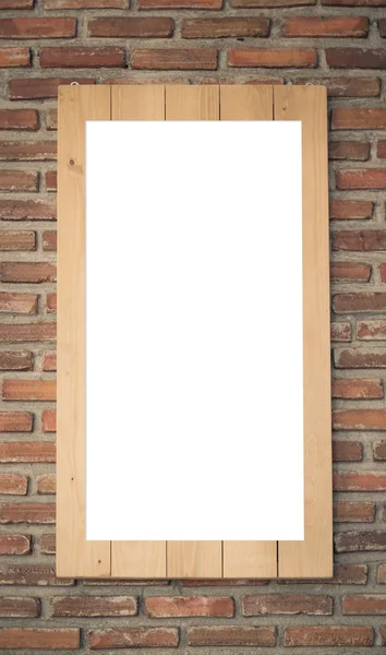Ξύλινο πλαίσιο σε έναν τοίχο από τούβλα — Φωτογραφία Αρχείου
