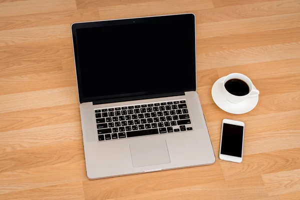 Laptop with coffee cup — Stock Photo, Image