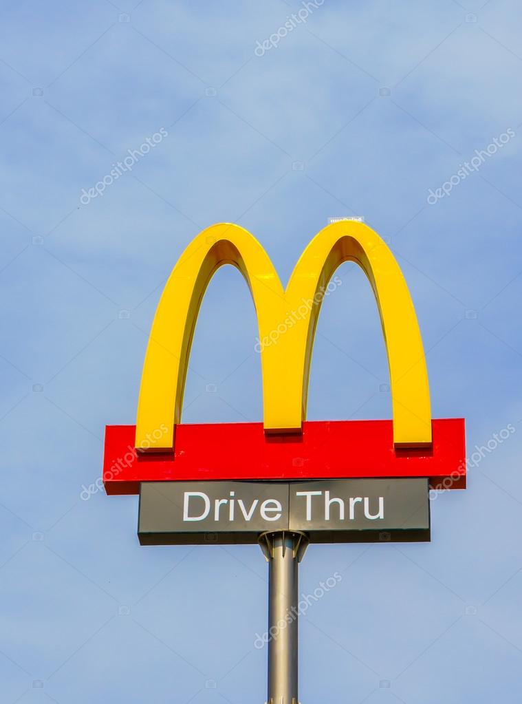 KHONKAEN PROVICE, THAILAND - 20, DECEMBER, 2015 : McDonalds logo on blue sky McDonald's Corporation is the world's largest chain of hamburger fast food restaurants.