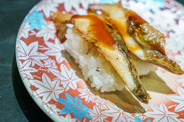 Eel sushi on  colorful plate — Stock Photo, Image