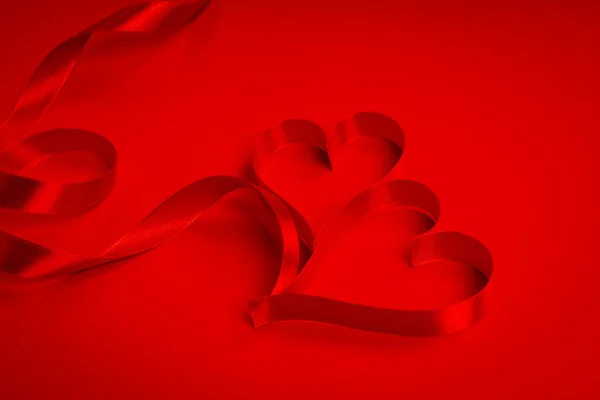 Red heart shape ribbons — Stock Photo, Image