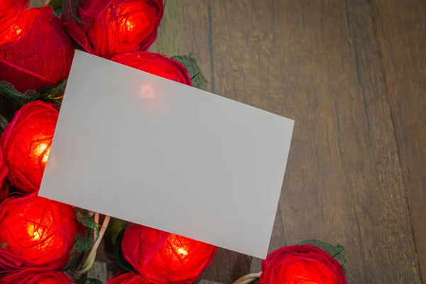 Rosas vermelhas com luzes — Fotografia de Stock