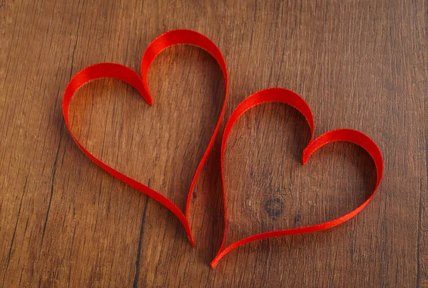 Red heart shape ribbons — Stock Photo, Image