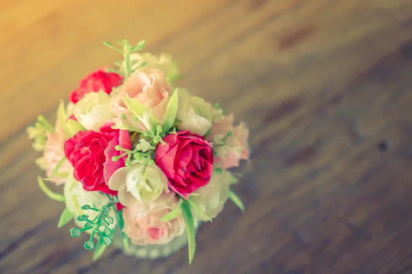 Bunch of beautiful flowers on table ( Filtered image processed v — Stock Photo, Image