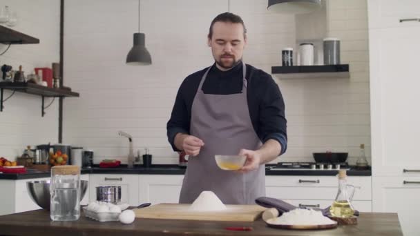 Young Handsome Male Chef Preparing Dough Home Kitchen Chef Apron — Stock Video