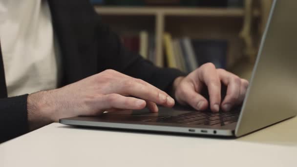 Close-up of the keyboard. Businessman working on the laptop. — Stock Video