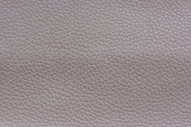 Tekstil, mobilya ve giysi tasarımı için yapay kumaşlardan yapılmış arka planlar. Mobilya döşemesi için deri kumaş. Metni kopyalamak için alanı olan duvar kağıdı. Kumaşın dokusu..