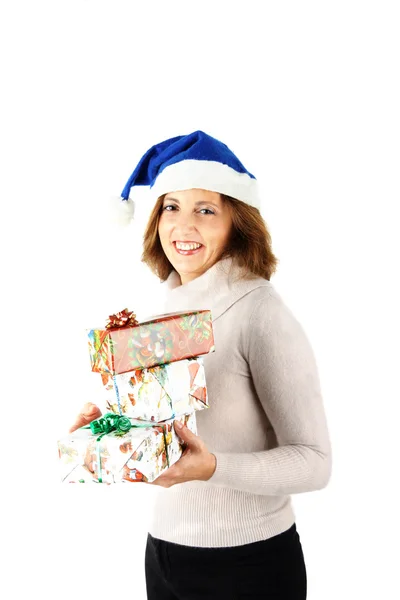 Woman is holding Christmas gifts — Stock Photo, Image