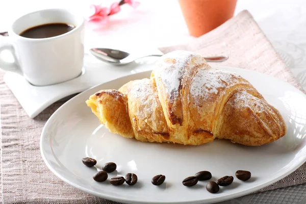 Breakfast with coffee and croissants — Stock Photo, Image