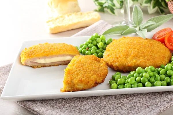 Cutlet stuffed with ham and melted cheese — Stock Photo, Image