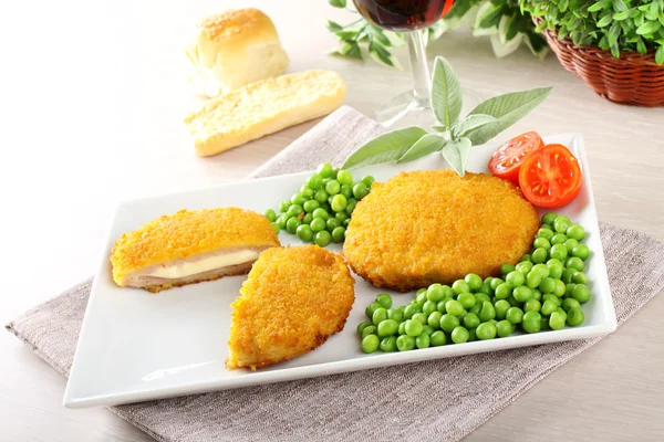 Cutlet stuffed with ham and melted cheese — Stock Photo, Image