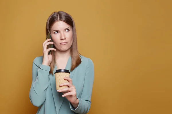 Serious Woman Entrepreneur Poses Takeaway Coffee Smartphone Works New Business Fotos de stock libres de derechos