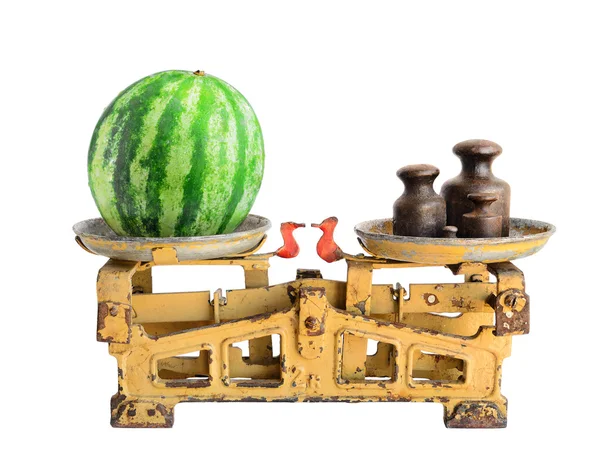 Watermelon on old scales — Stock Photo, Image